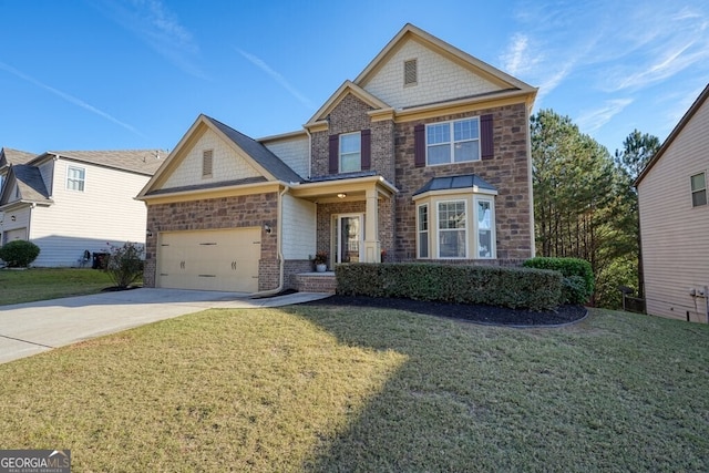 view of front of house with a garage and a front yard