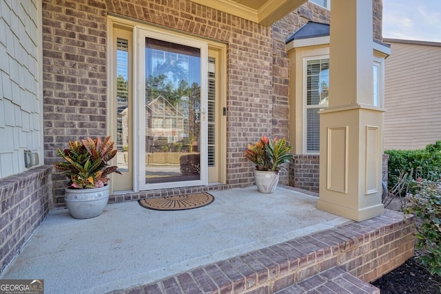 entrance to property with covered porch