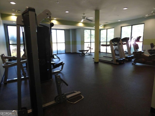 exercise room with ceiling fan