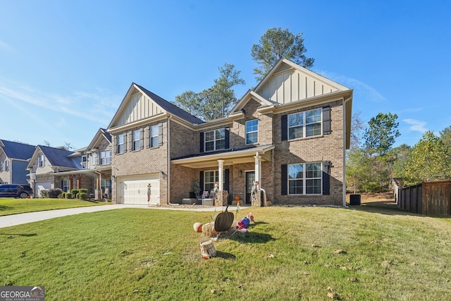 view of front facade with a front yard and a garage