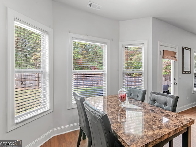 dining area with light wood-type flooring