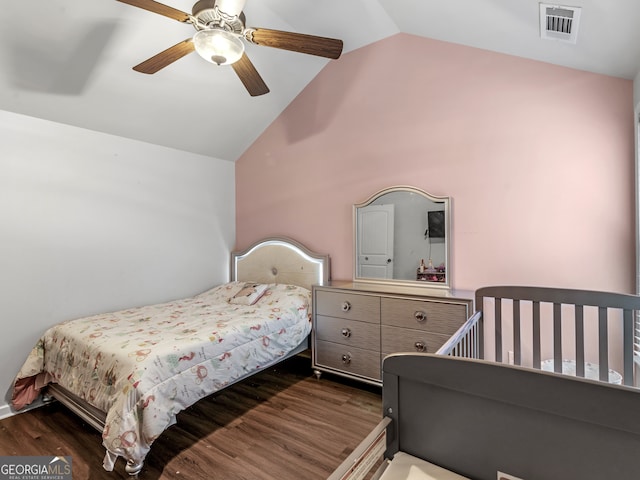 bedroom with dark hardwood / wood-style floors, high vaulted ceiling, and ceiling fan