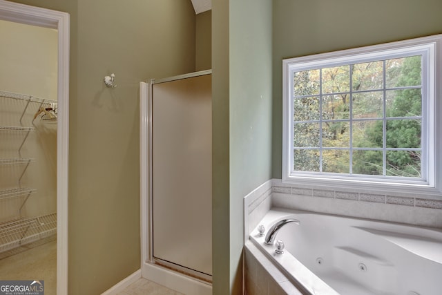 bathroom with independent shower and bath