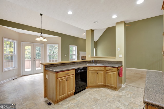 kitchen featuring french doors, sink, dishwasher, a chandelier, and hanging light fixtures