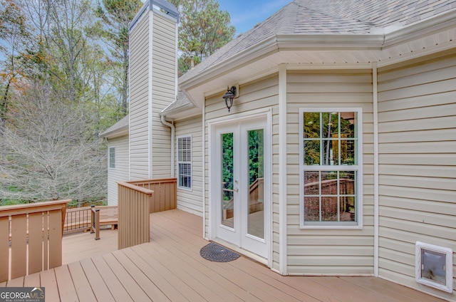 wooden terrace featuring french doors