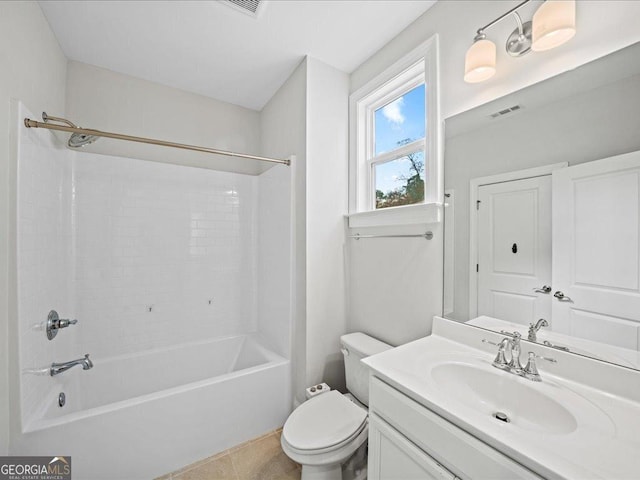 full bathroom featuring tile patterned flooring, vanity,  shower combination, and toilet