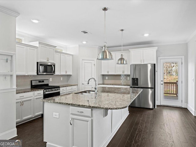 kitchen with white cabinetry, sink, a center island with sink, and appliances with stainless steel finishes