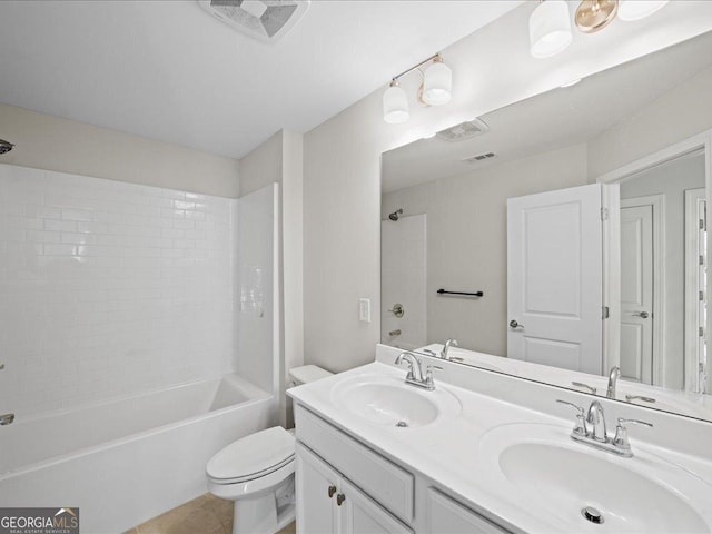 full bathroom featuring tile patterned floors, vanity, shower / bath combination, and toilet