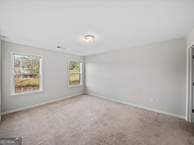 view of carpeted spare room