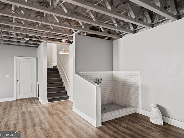 basement with wood-type flooring