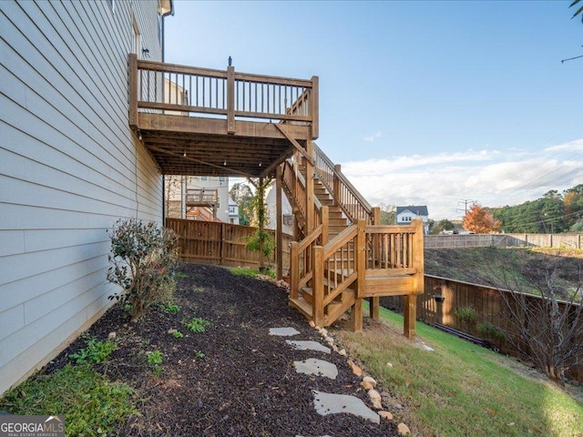 view of yard with a wooden deck