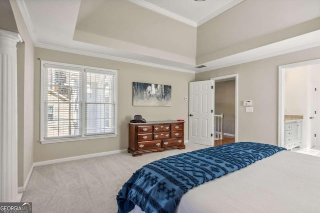 carpeted bedroom featuring connected bathroom and ornamental molding