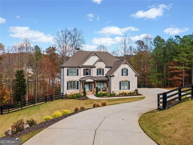 view of front of property with a front lawn