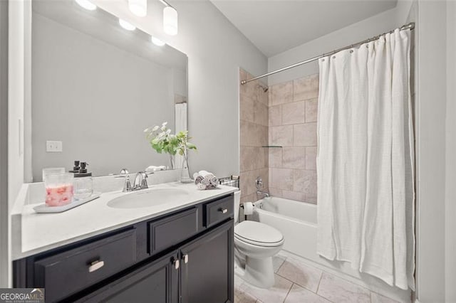 full bathroom with tile patterned flooring, vanity, shower / bath combo, and toilet