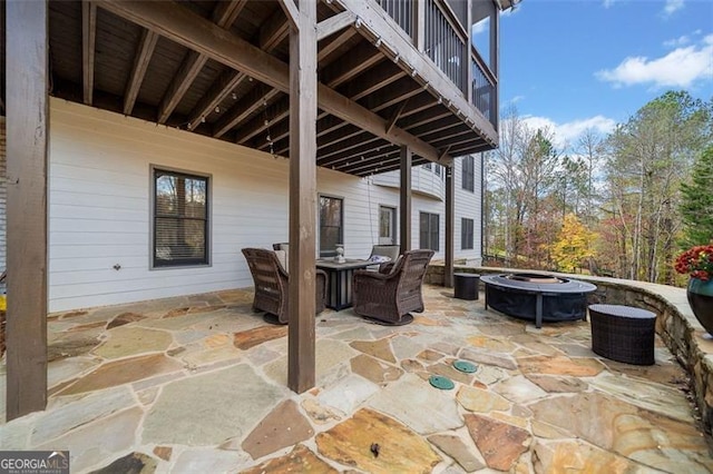 view of patio with a balcony