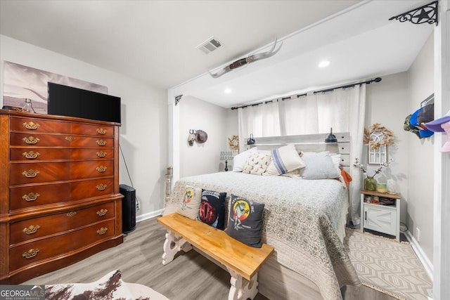 bedroom featuring light hardwood / wood-style flooring