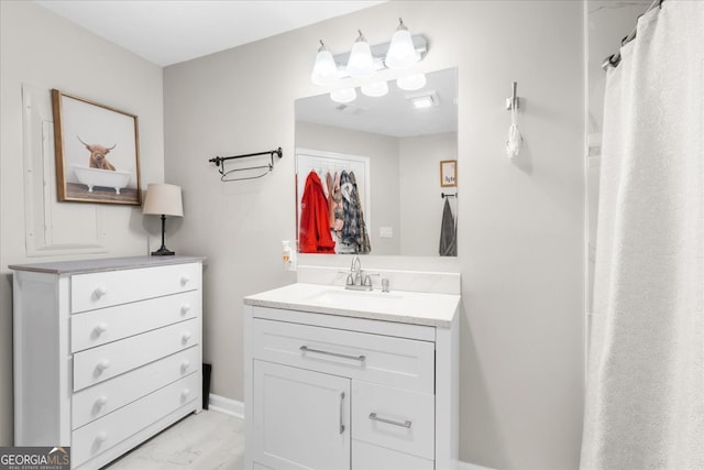 bathroom featuring vanity and walk in shower