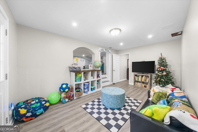 playroom featuring light hardwood / wood-style floors