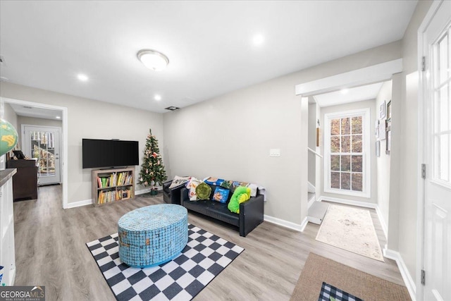 173 Mountainside Dr E, Dawsonville, GA 30534 - living room with light wood-type flooring, baseboards, and recessed lighting