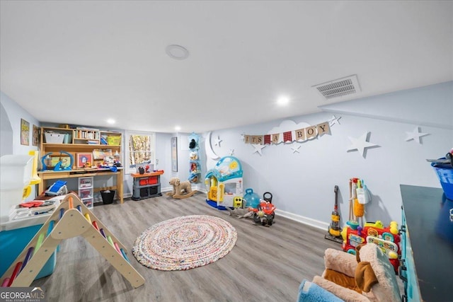 173 Mountainside Dr E, Dawsonville, GA 30534 - playroom with wood finished floors, baseboards, and recessed lighting