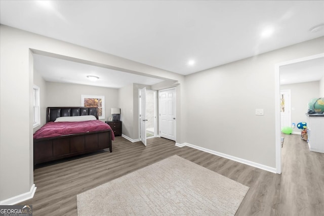 bedroom featuring hardwood / wood-style floors