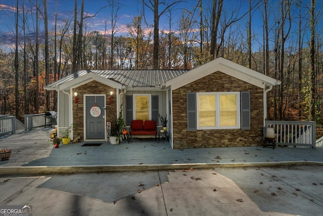 view of front of property with a deck