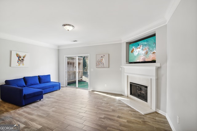 living room featuring ornamental molding and hardwood / wood-style flooring