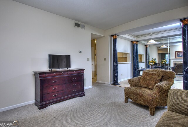 living area with light colored carpet