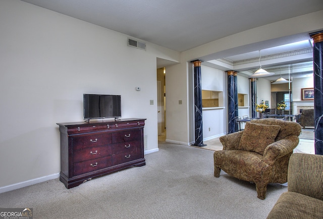 sitting room featuring a fireplace, carpet flooring, visible vents, and baseboards