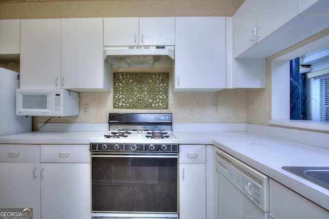 kitchen featuring light countertops, white appliances, white cabinets, and under cabinet range hood