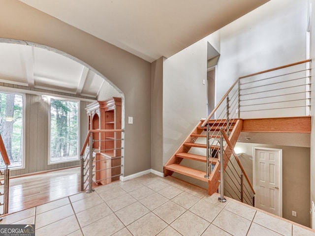 stairs with hardwood / wood-style flooring