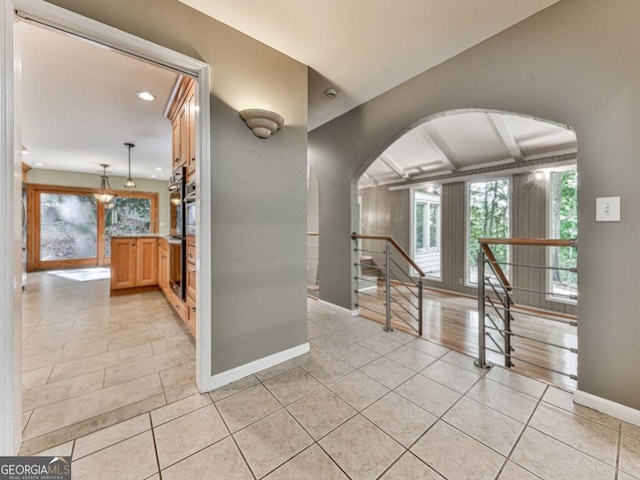 interior space with light tile patterned floors