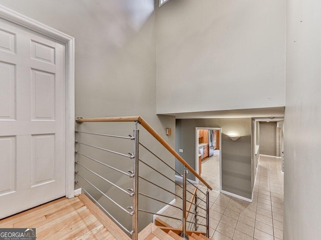 staircase featuring hardwood / wood-style floors