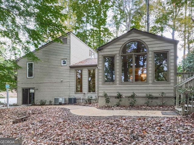 view of front of home featuring central air condition unit