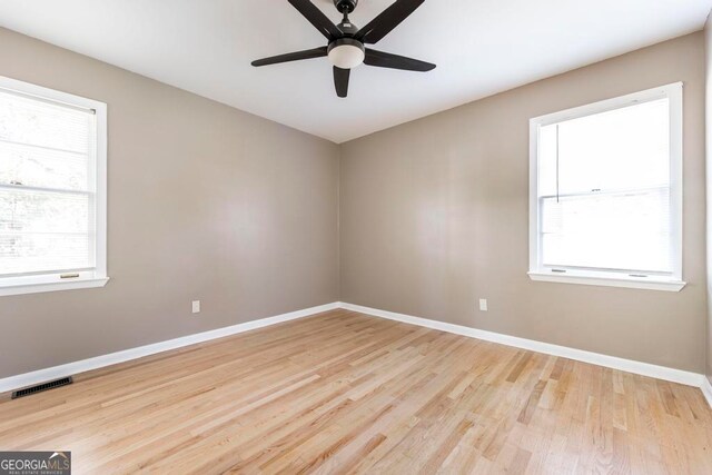 unfurnished bedroom featuring ceiling fan and light wood-type flooring