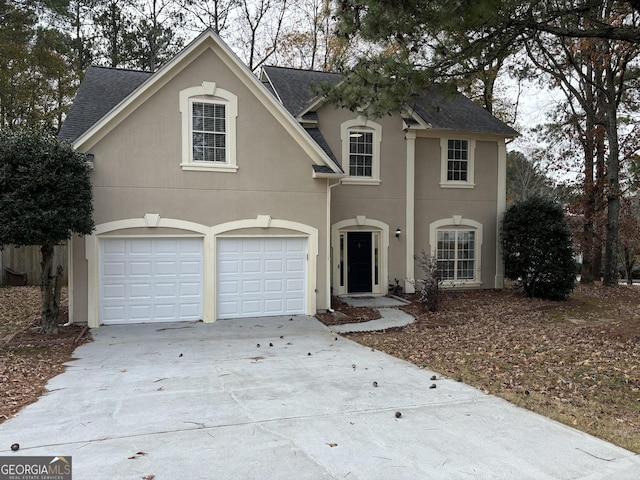 front of property featuring a garage