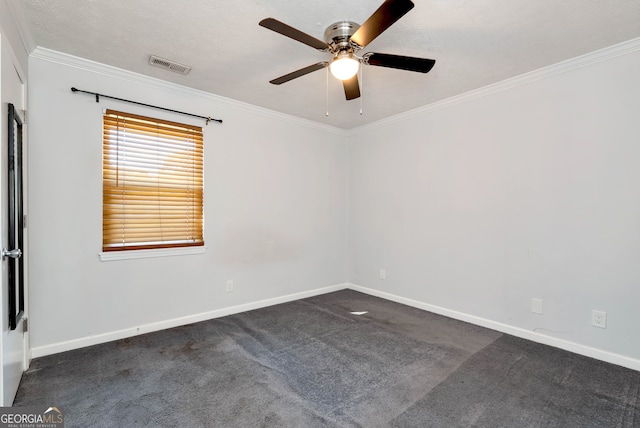 carpeted spare room with ceiling fan, a textured ceiling, and ornamental molding