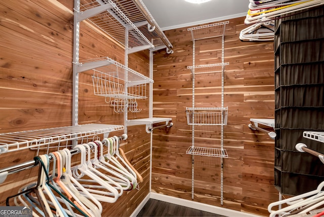 walk in closet featuring hardwood / wood-style floors