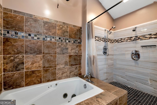 bathroom featuring tile patterned floors, lofted ceiling, and shower with separate bathtub