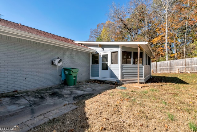 exterior space featuring a lawn