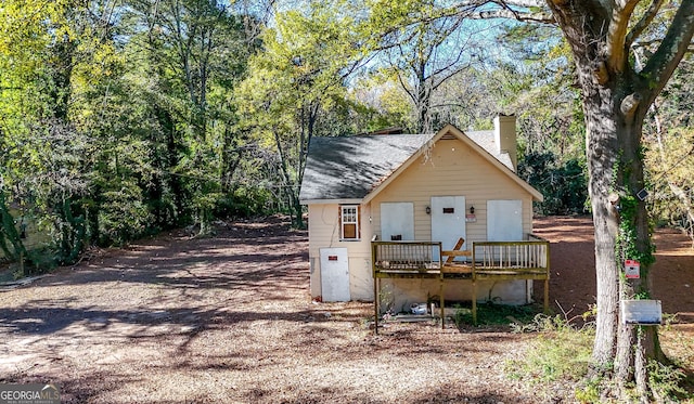 view of front of property featuring a wooden deck