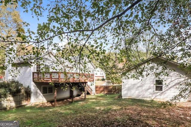 view of yard featuring a wooden deck