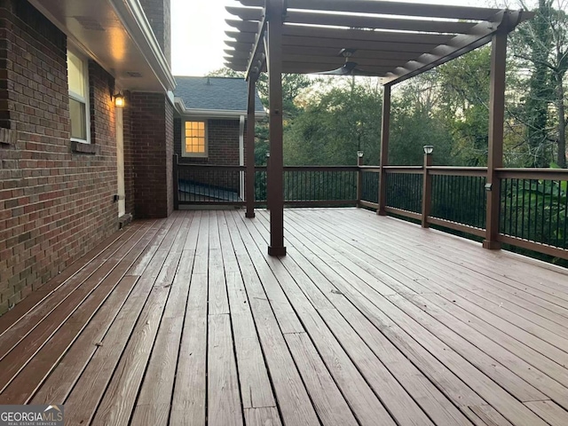 deck featuring a pergola and ceiling fan