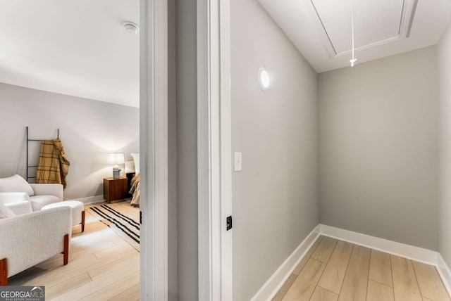 hall with light wood-type flooring