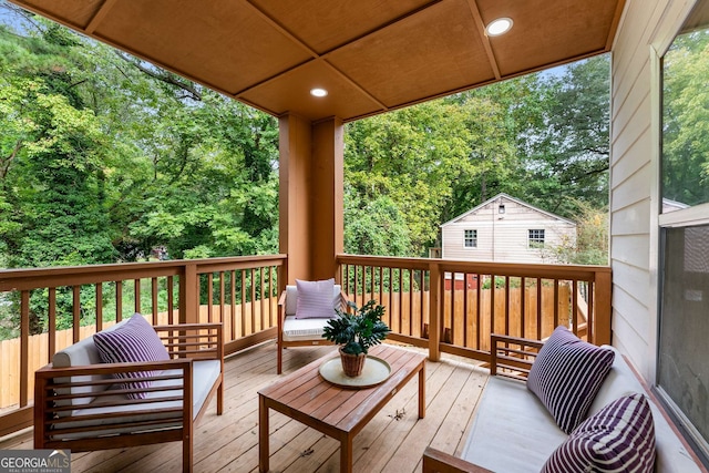 wooden deck with an outdoor hangout area