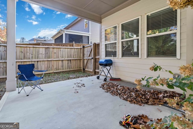 view of patio featuring a grill