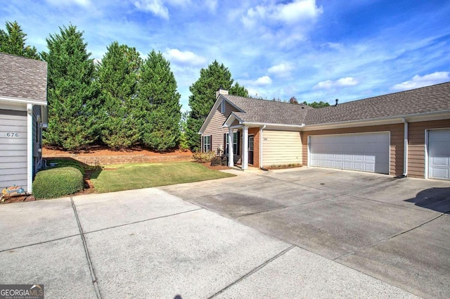 view of side of home with a garage