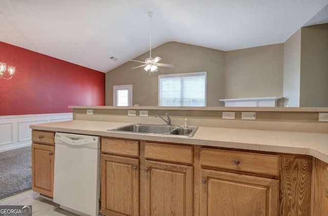 kitchen with ceiling fan, sink, white dishwasher, light colored carpet, and vaulted ceiling