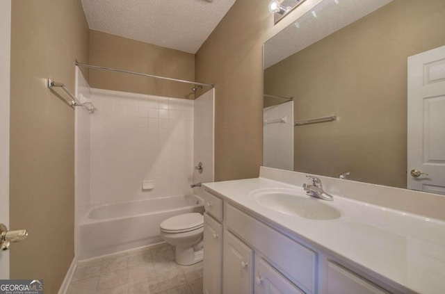 full bathroom with vanity, toilet, a textured ceiling, and bathing tub / shower combination