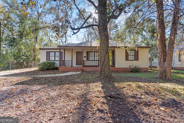 ranch-style home with a porch